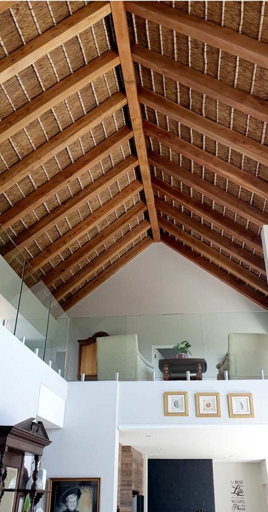 Cape Reed tribute project timber and thatched roof interior