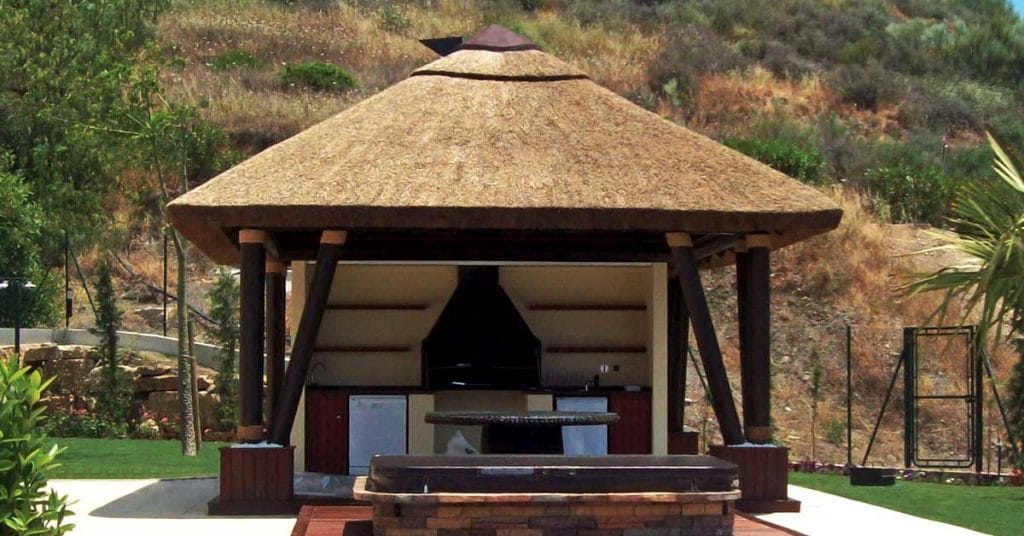 Outdoor thatched gazebo with built in BBQ area