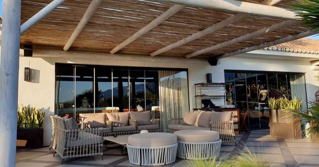 The Boho Club Marbella restaurant timber pergola over the terrace