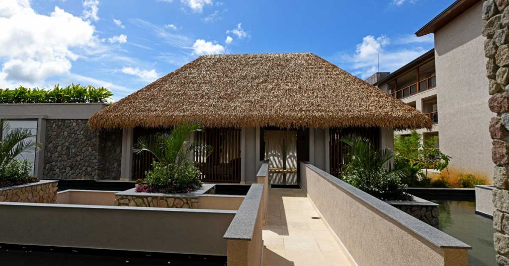 Cape Reed synthetic thatch roof chalet Cabrits Resort Kempinski Dominica
