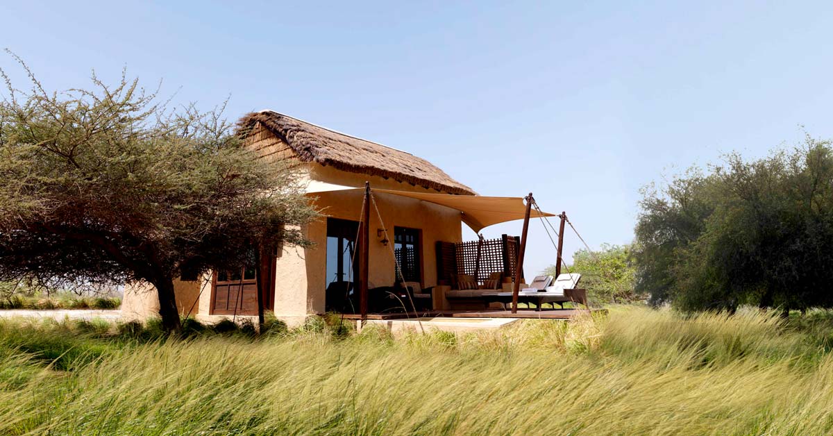 Cape Reed thatched roof chalet at Anantara Sir Bani Yas