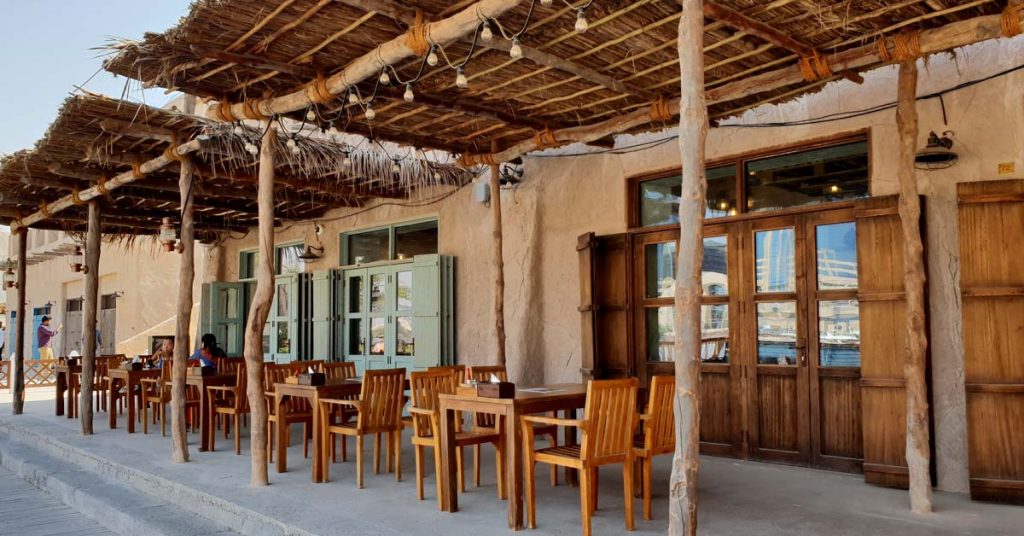Cape Reed timber construction rustic pergola with barasti pam fronds