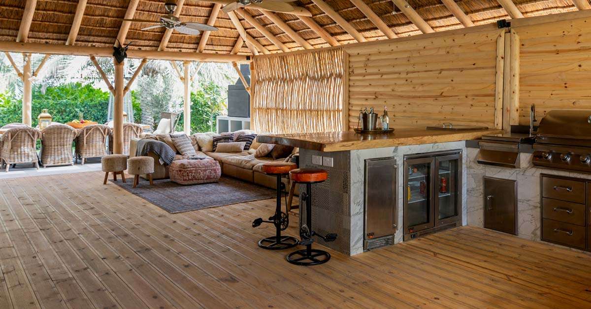 Timber decking with cladding and lath screen
