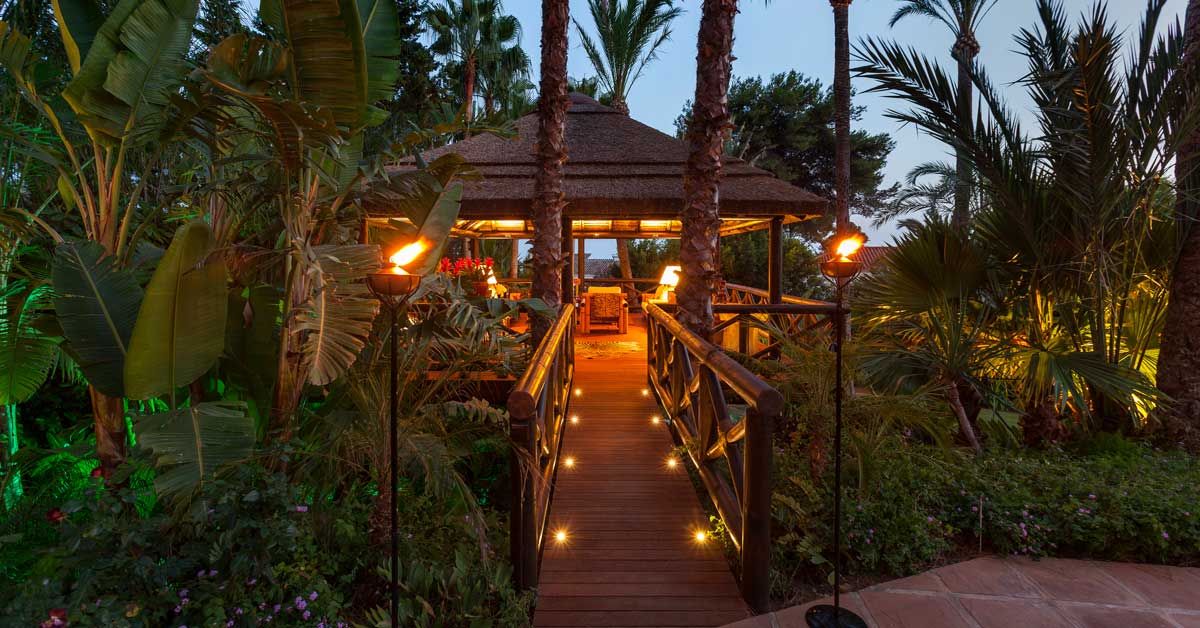Cape Reed thatched gazebo with timber decking, balustrades and walkway.