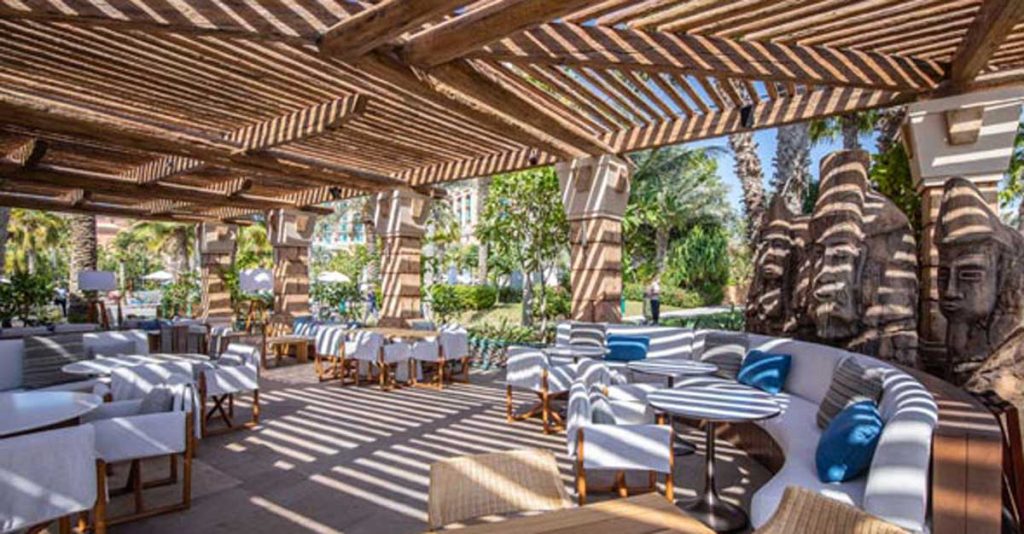 White Beach timber pergolas over seating area at the restaurant