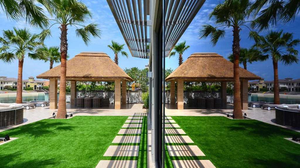 Thatched gazebo on concrete cladded columns and bearers