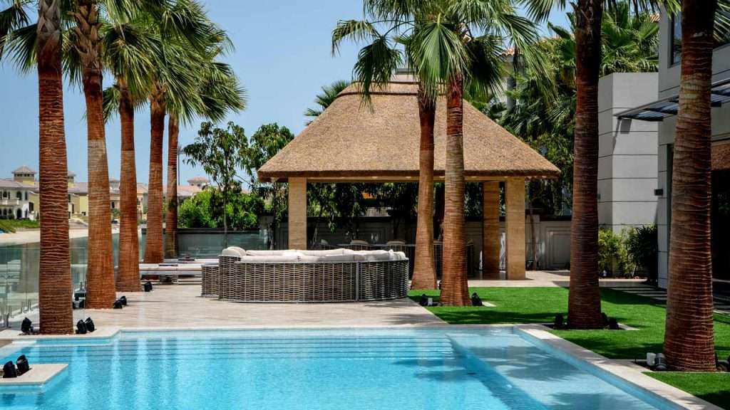 Thatched gazebo with outdoor seating area on the Palm Jumeirah