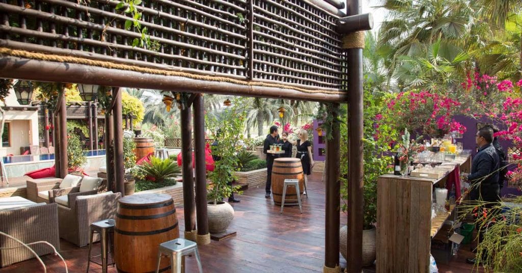 Stained timber pergola with decorative screen