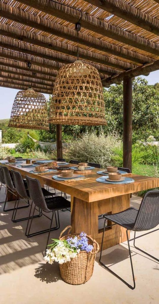 Timber pergola with decor and dining area