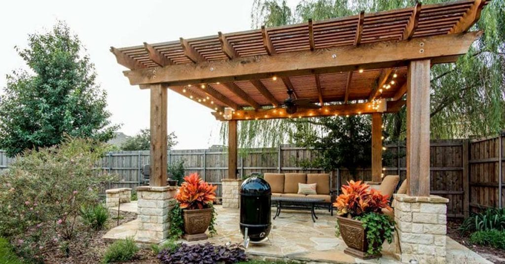 Timber pergola with lighting and seating