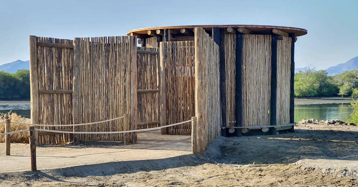 Bird hide with lath cladding