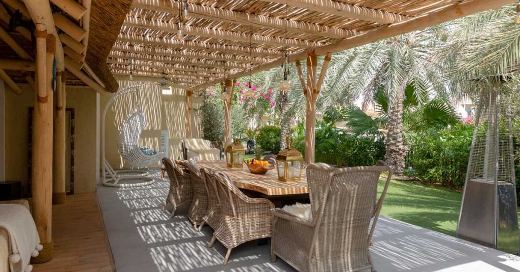 Idyllic backyard oasis with eucalyptus timber pergola