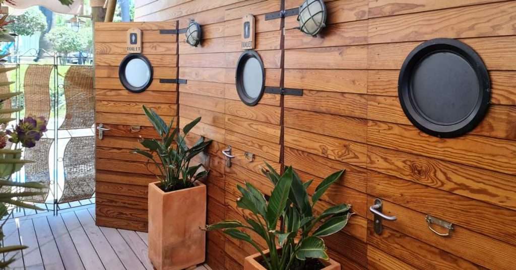 Rustic timber wall cladding adding natural charm to the exterior of a building.