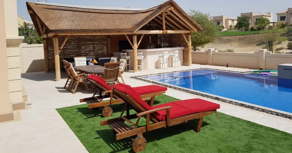 Poolside timber sunlounger