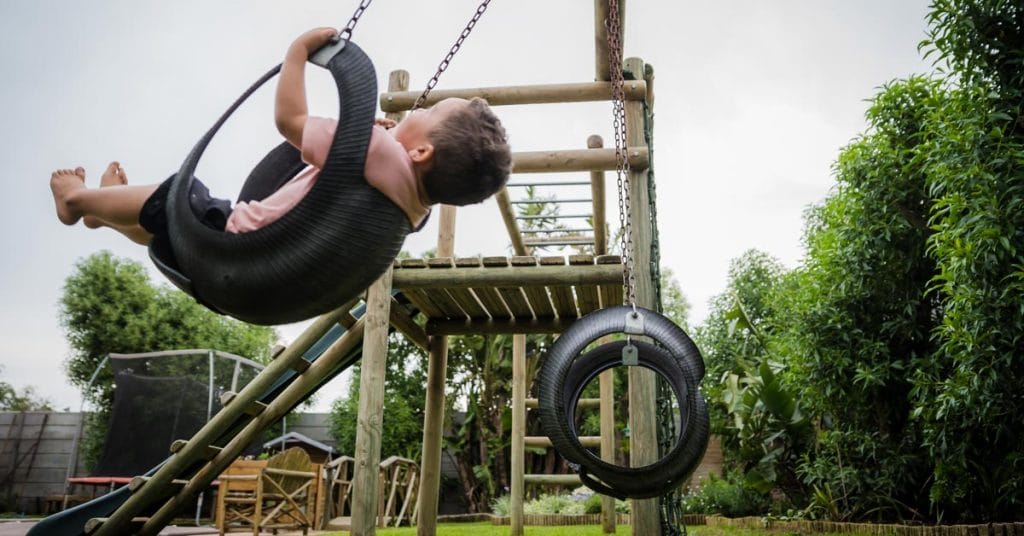 Timber kids playstructure with swing