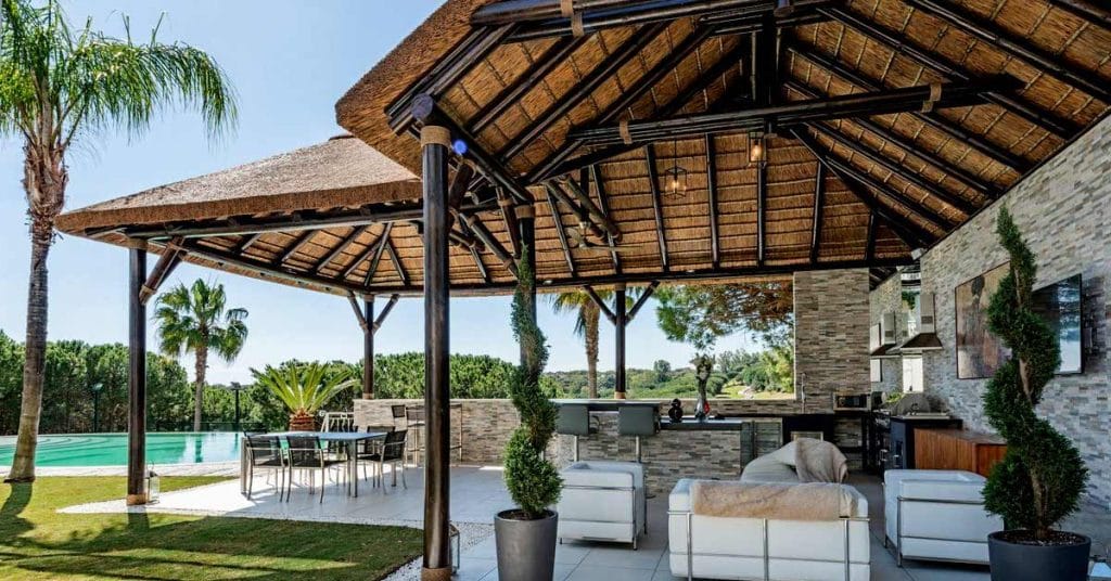 Thatched Gazebo with Outdoor Kitchen in a Picturesque Setting