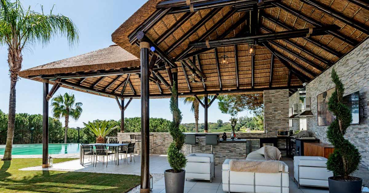 Thatched Gazebo with Outdoor Kitchen in a Picturesque Setting
