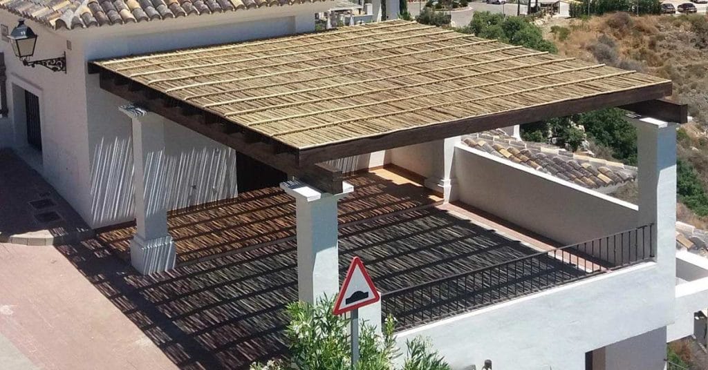 Timber and lath car port at a villa in Benahavis Hills.