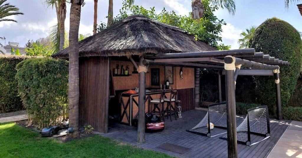 Before Cape Reed thatch roof maintenance
