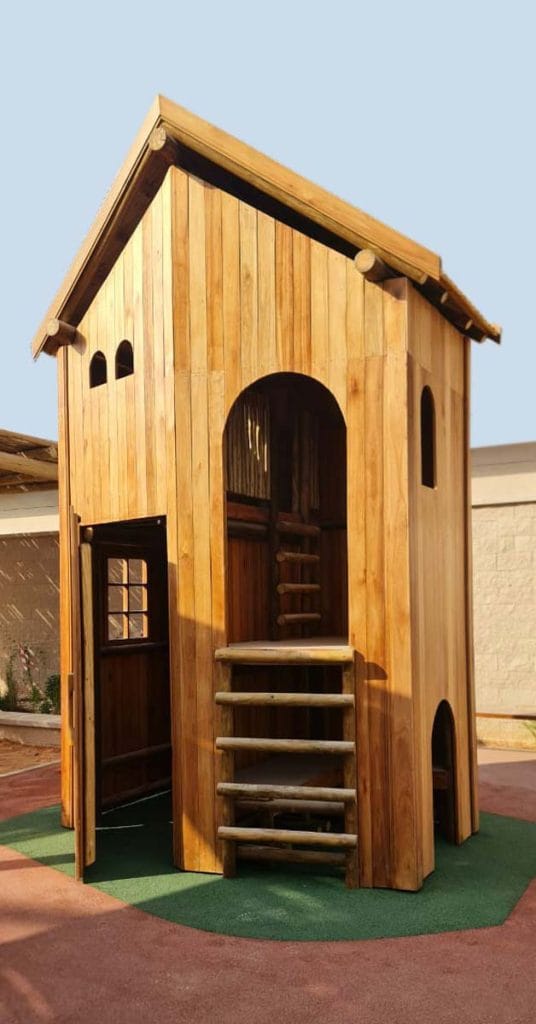 Eco-friendly timber play structures blending with nature at Misk School, Saudi Arabia.