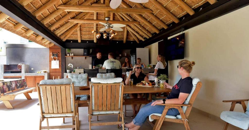 Ideal for both relaxation and social gatherings, this thatched outdoor living room seamlessly blends comfort with nature, providing a perfect retreat from the hustle and bustle of everyday life.