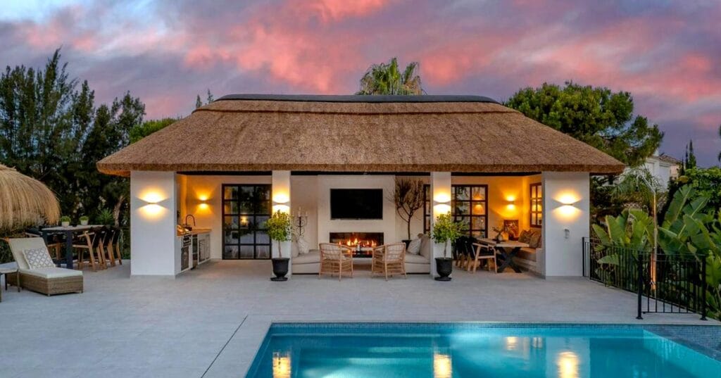 A modern Cape Reed poolside thatched gazebo.