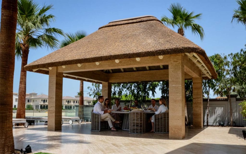 Cape Reed thatched roof on concrete pillars.