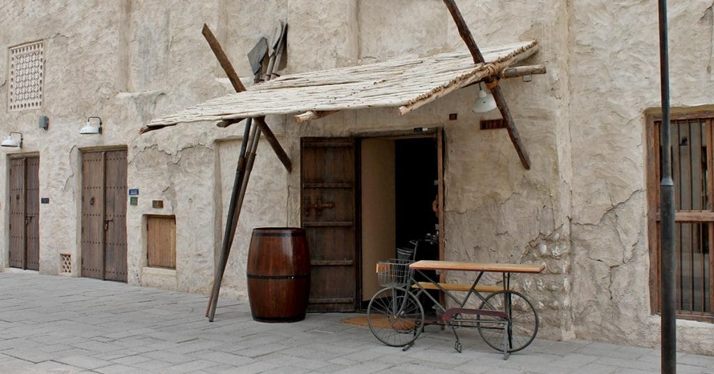 Wooden pergola awning creating shade at Al Seef.