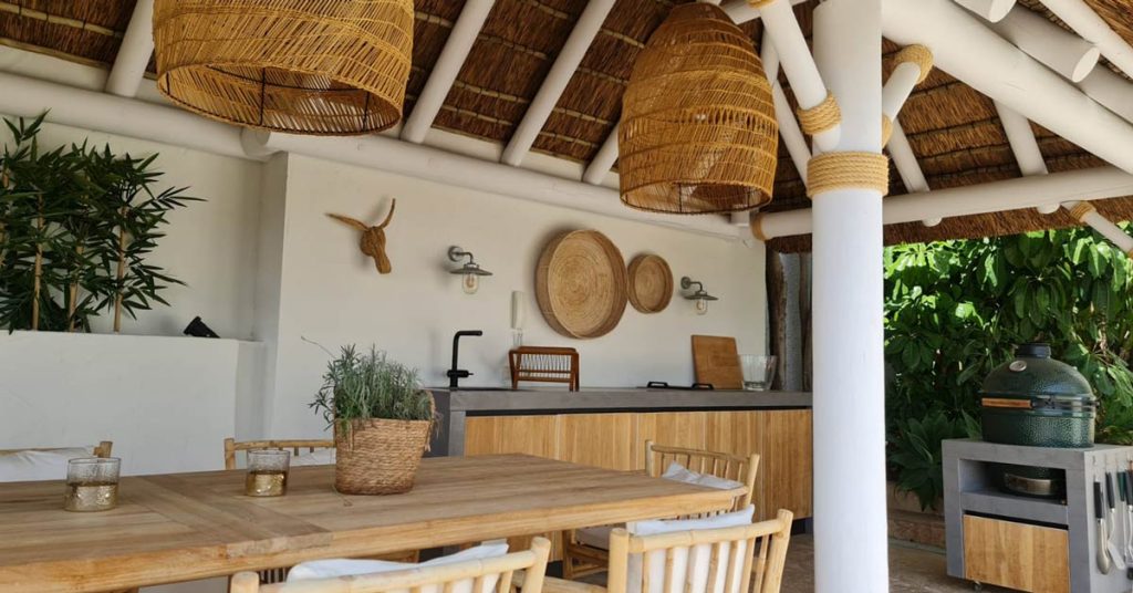 boho-chic-thatched-outdoor-seating-area