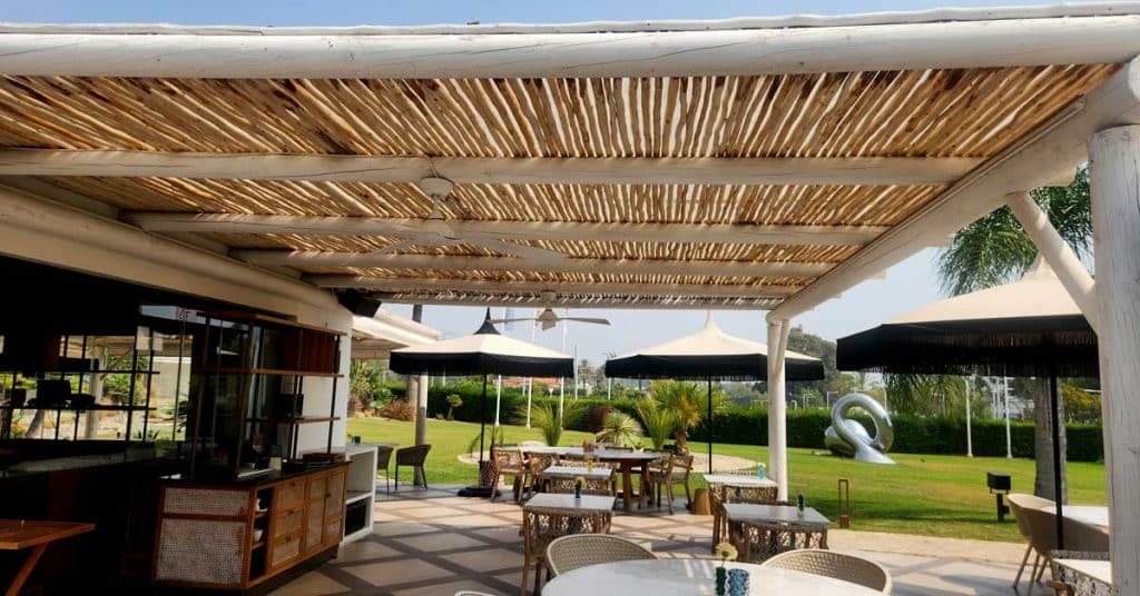 Wooden whitewash pergola at the Boho Club in Marbella